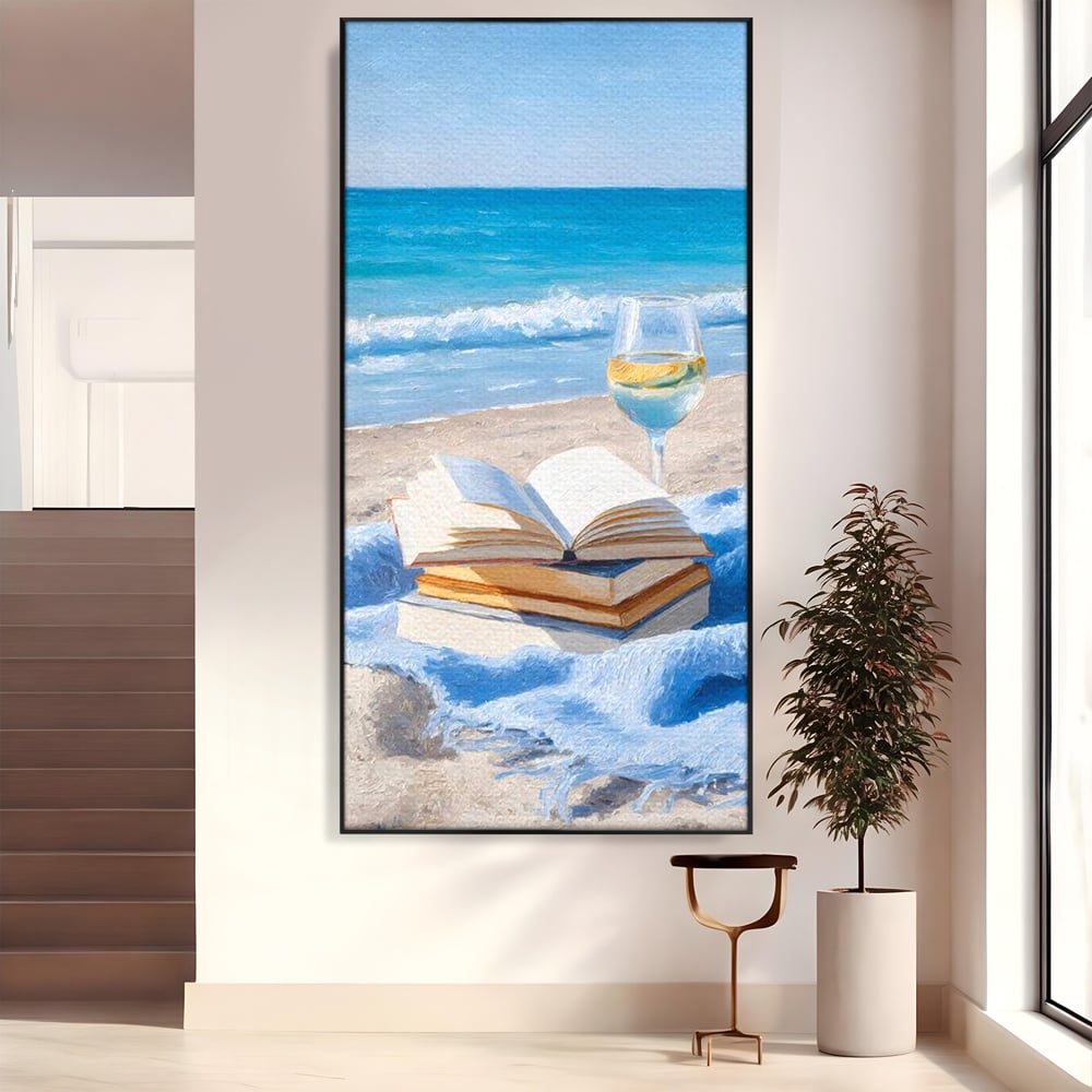 Tablou canvas cu pictura cu carti si pahar de vin pe plaja, in rama de aluminiu negru